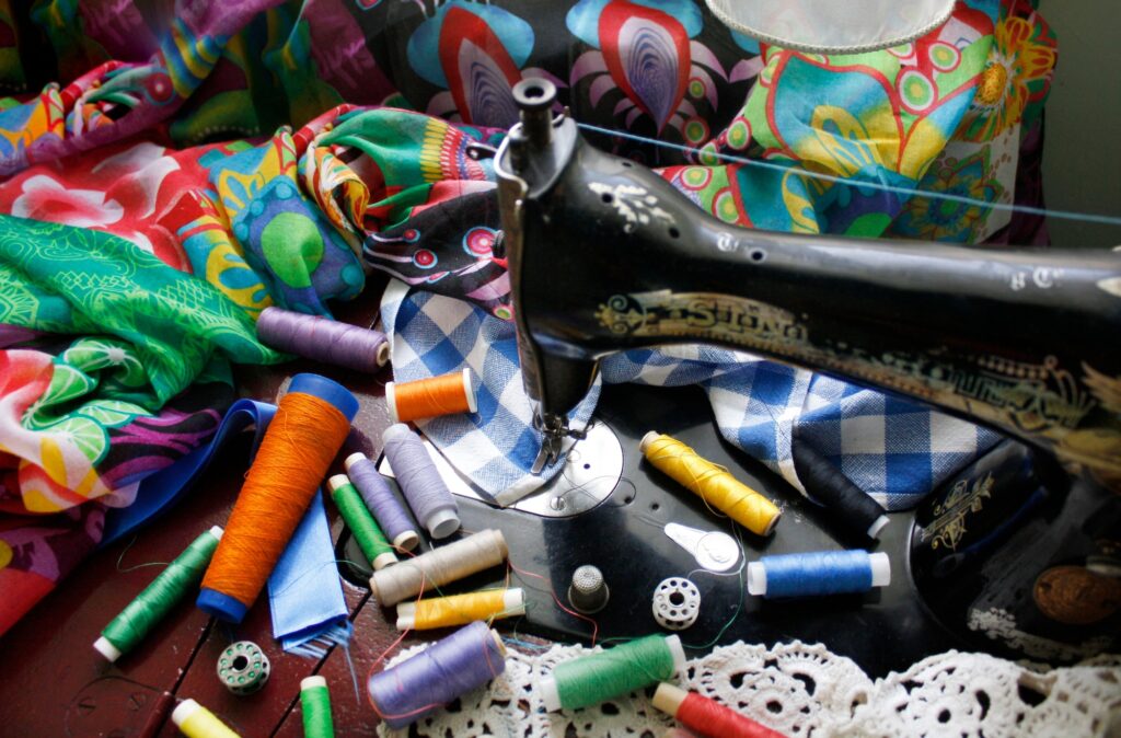 Colorful sewing threads and a sewing machine